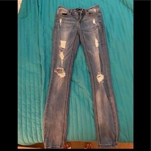 Clingers medium wash denim ripped jeans